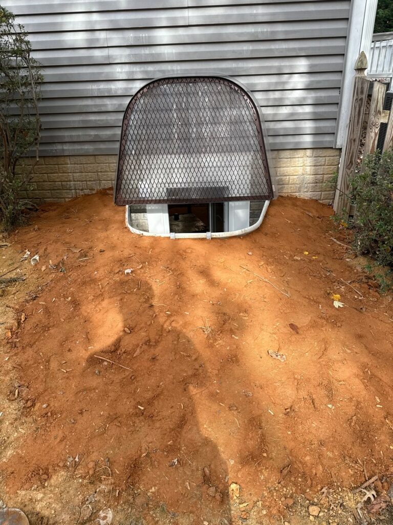 Restored yard after egress window installation in Burke VA