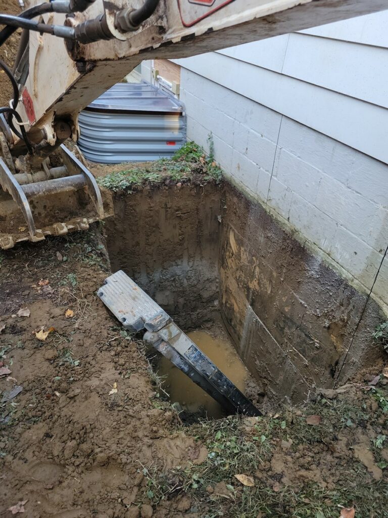 Excavation for egress window installation in Vienna VA