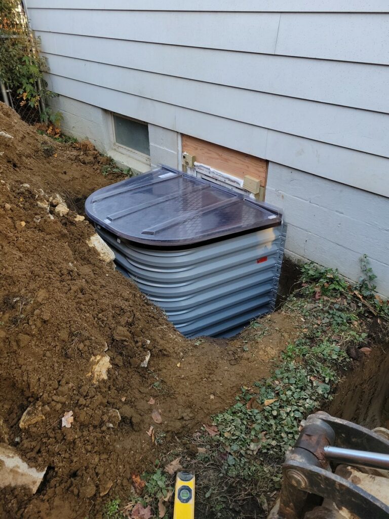 Excavation for egress window installation in Vienna VA