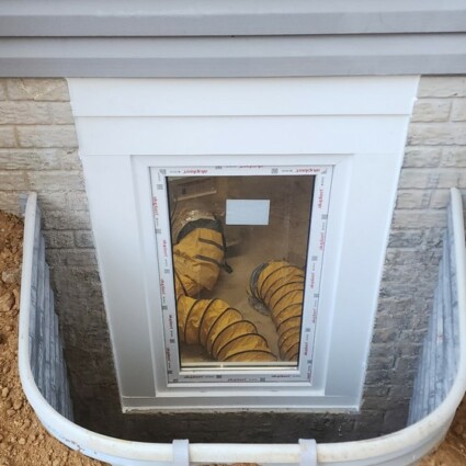 Egress Window Installation In Burke VA White Boman Kemp window well installed in Burke VA