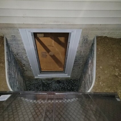 Egress Window Installation In Vienna VA Newly installed 30x60 egress window with window well in Vienna VA basement